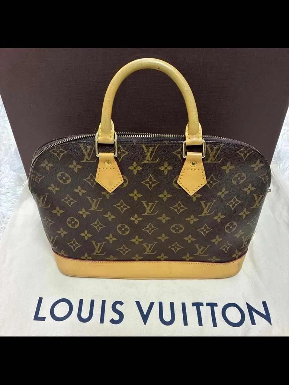 Louis Vuitton Monogram Alma PM Satchel in Brown and Natural Vachetta